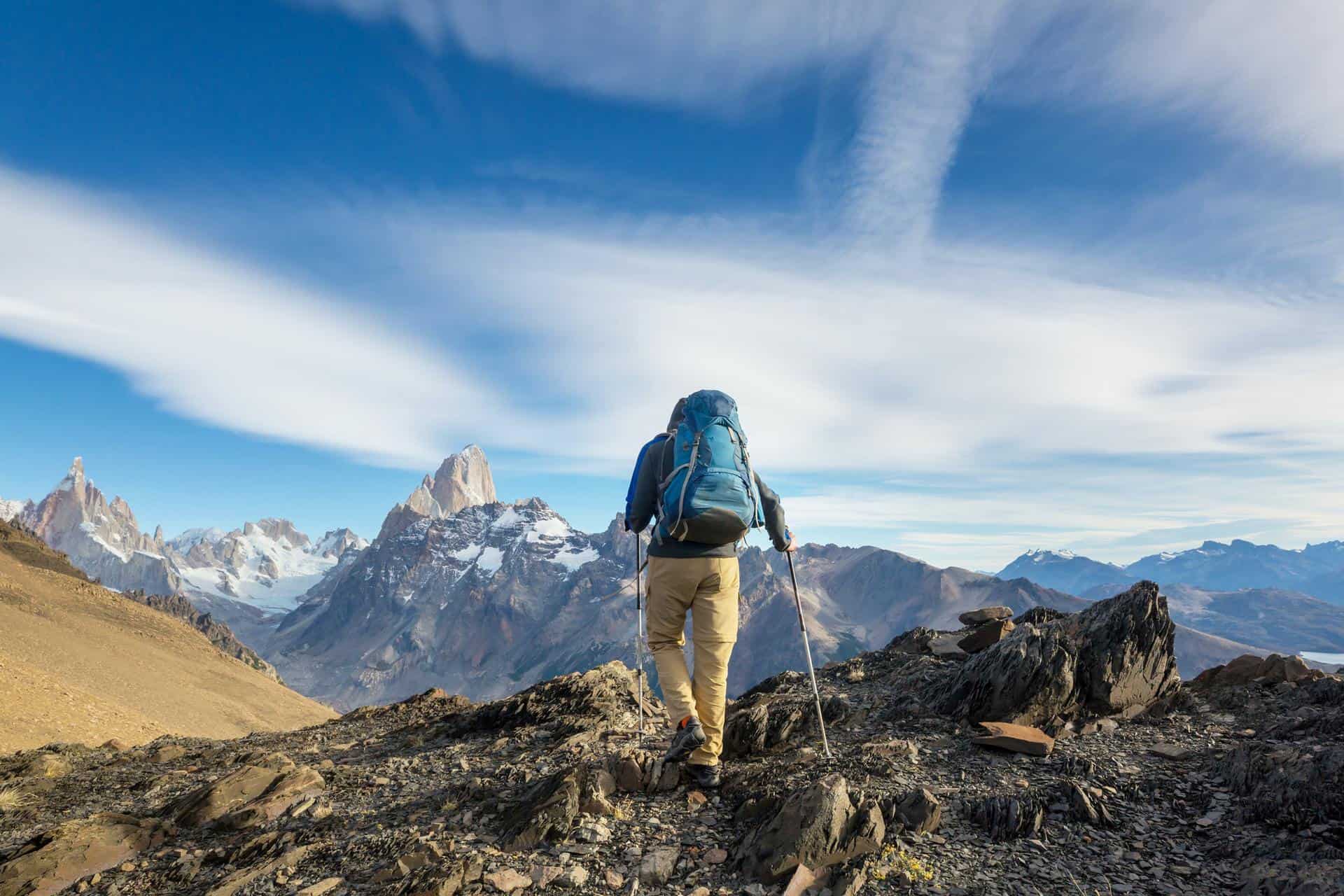 back of mountain climber climbing in Pategonia